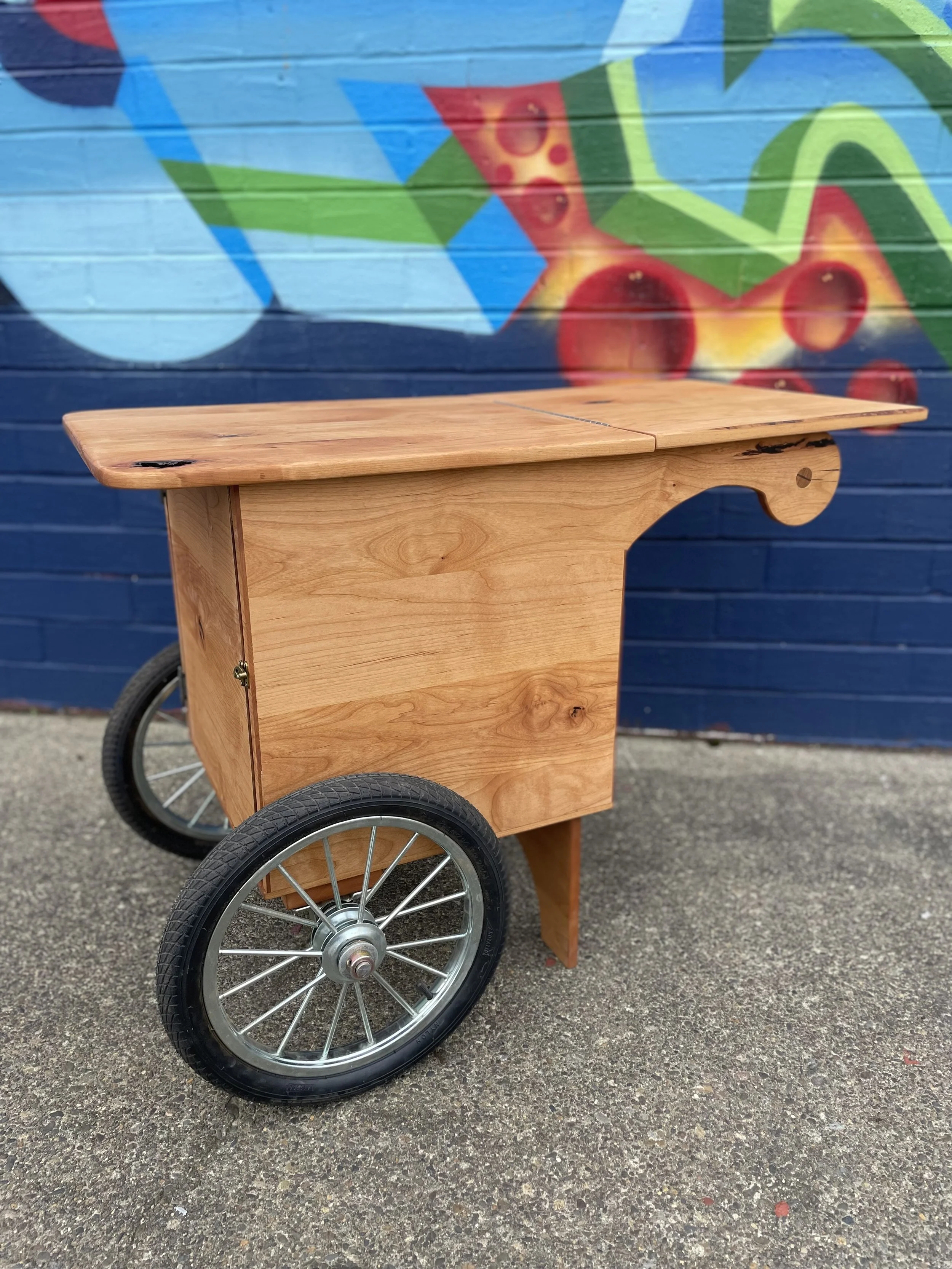 Custom folding top cart with internal cabinet and drawers.
Alder with Walnut accents.
$1,400