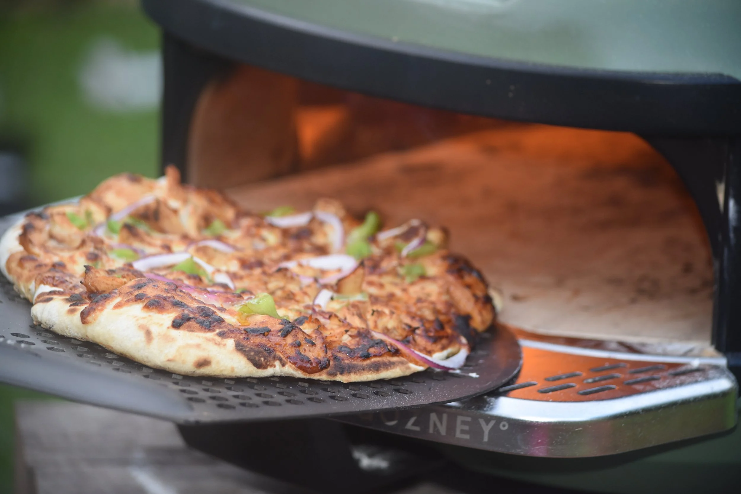Pizza cooked in a Gozney pizza oven