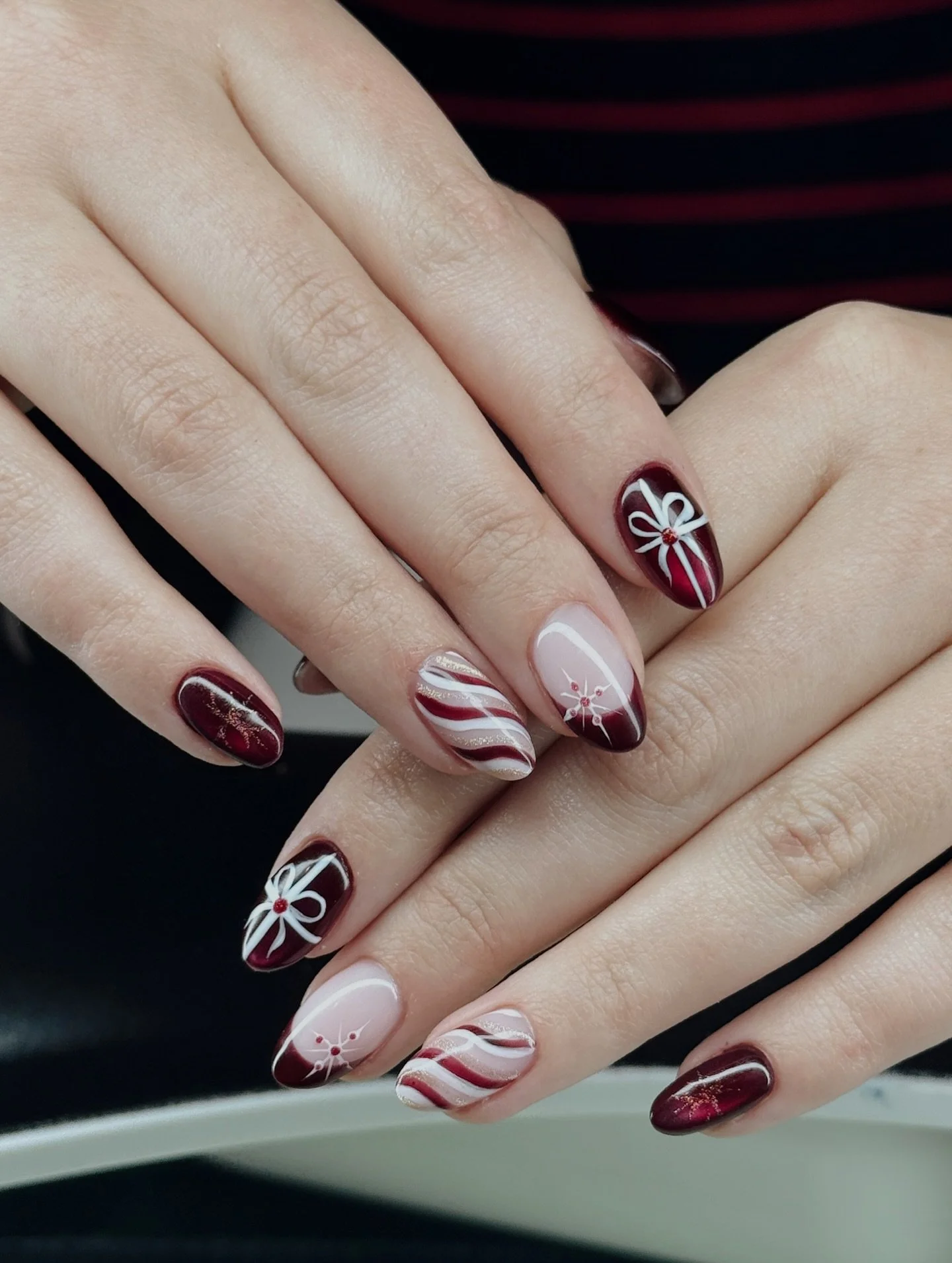 Details like these don&rsquo;t go unnoticed 🎄❤️&zwj;🔥 enjoy this montage of Anna&rsquo;s iconic holiday nails!
Nails by @groovynailstudio 
&bull;
&bull;
#soal #soalthelabel #winnipeg #winnipegnails #winnipegsalon