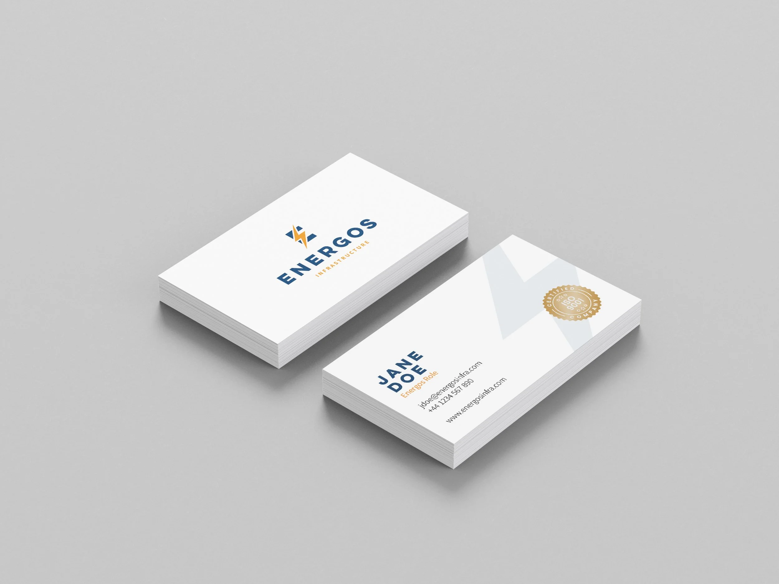 ENERGOS_Business-Cards_WHITE_ISOGoldFoil_MOCKUP.jpg