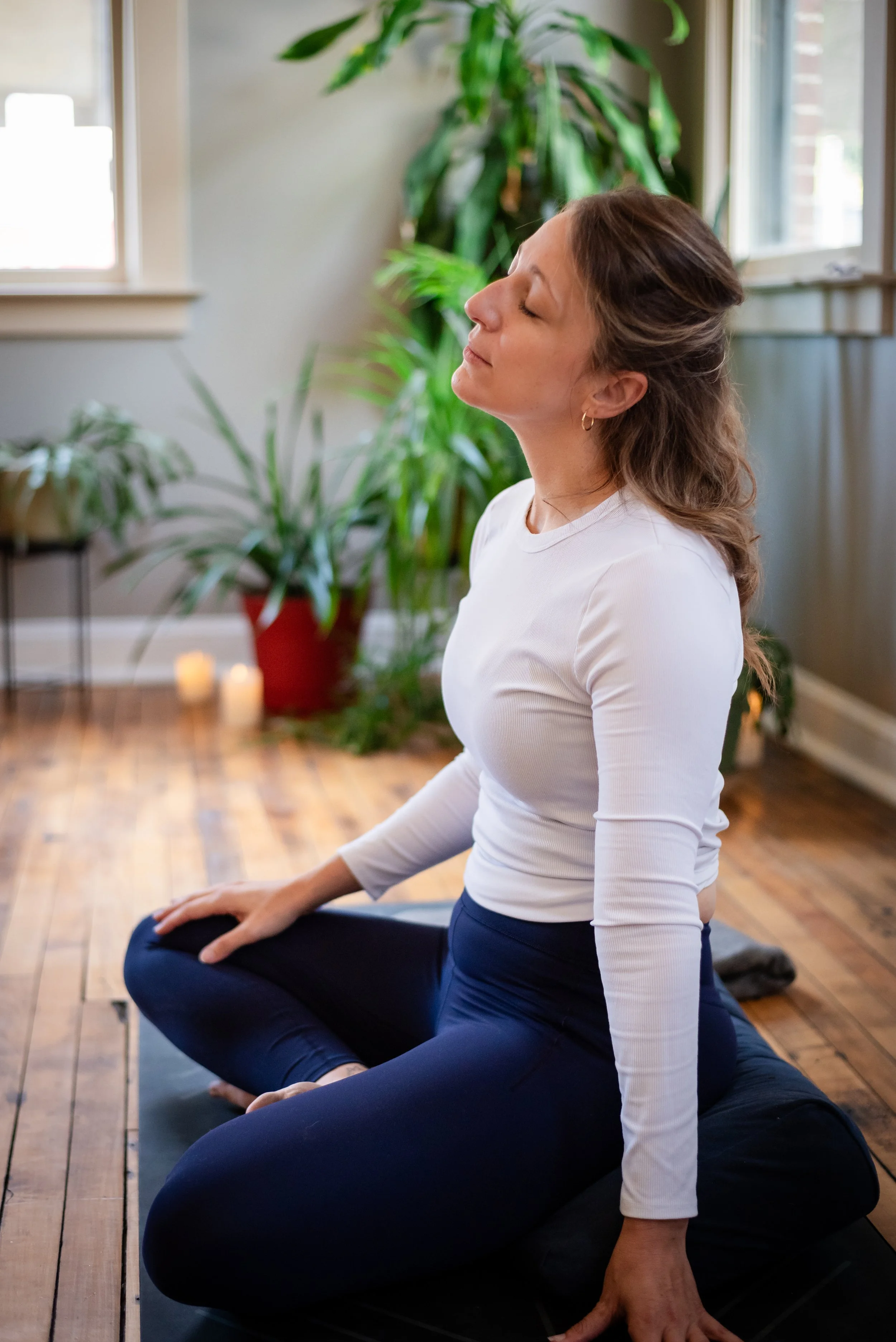 Emily Webb Olsen leading a somatic yoga class in Roanoke Virginia