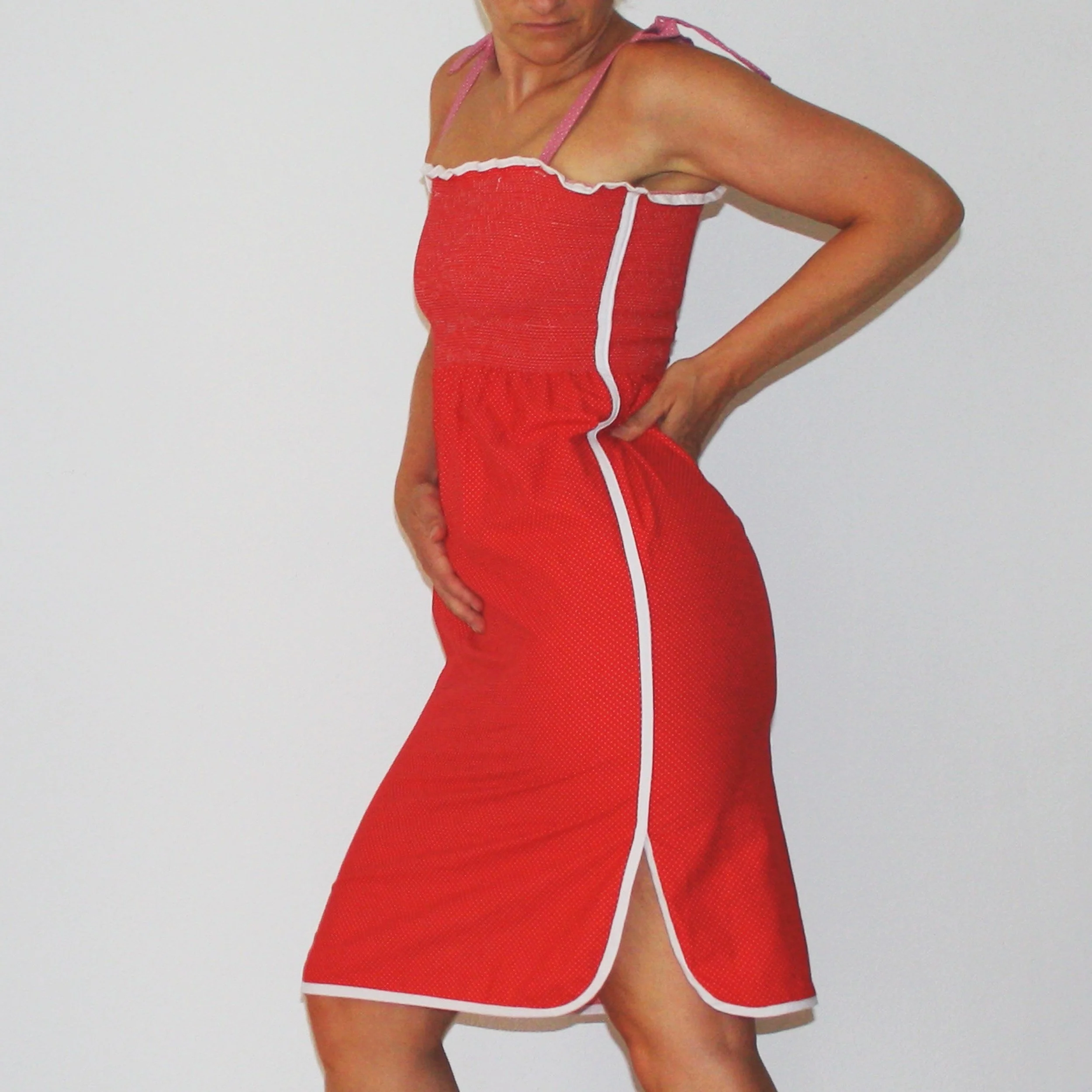 The Chiquita heel. Orange vegan leather strappy heel.