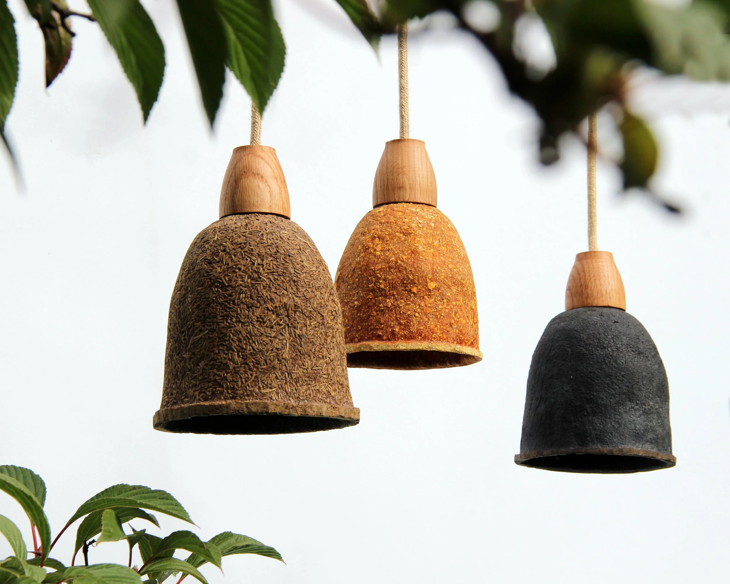 Biodegradable lampshade collection made of orange peels, coffee waste and pine needles