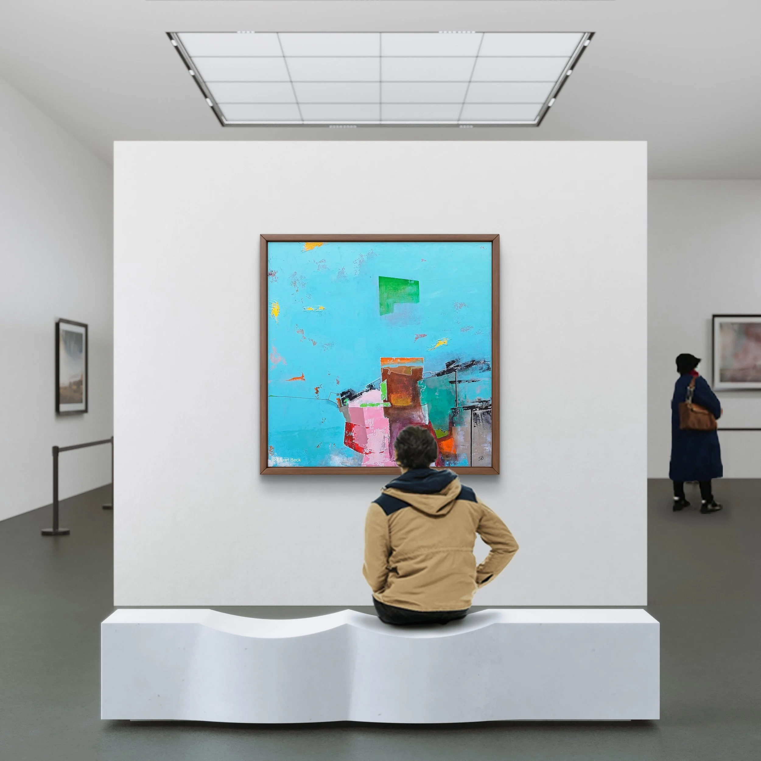 A person sitting on a white, modern bench in front of a colorful abstract painting in an art gallery.