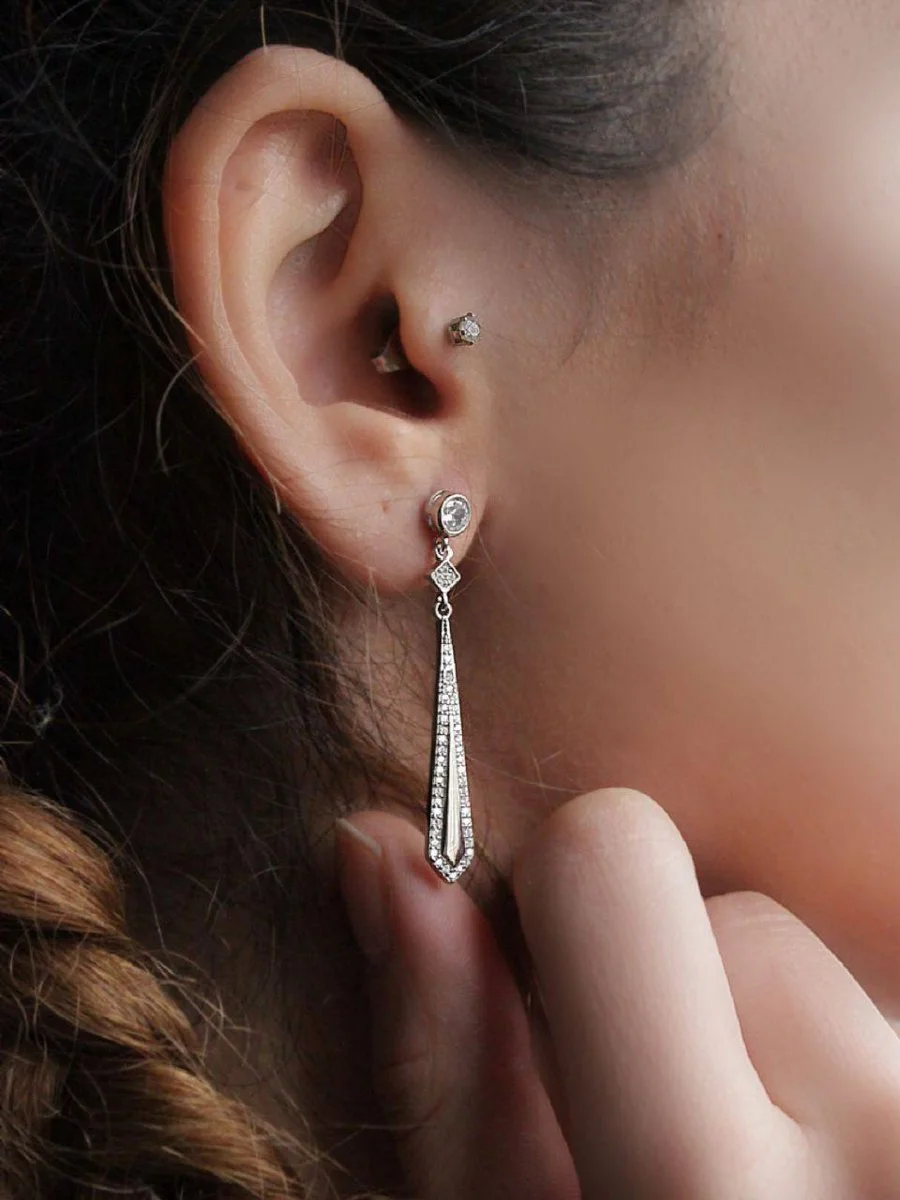 Close-up of an elegant earring, highlighting the craftsmanship of jewelry photography.