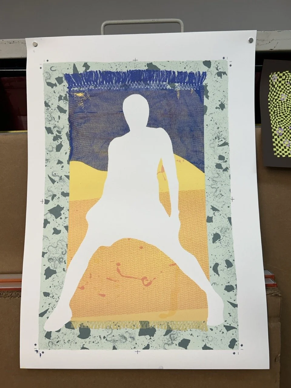 Silhouette of a person in a yoga pose against a colorful, textured background with a green speckled border.