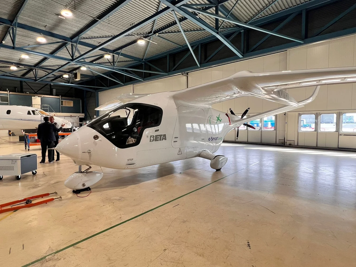 Electric aircraft displayed inside a hangar during the ClearSky Airlines announcement.
