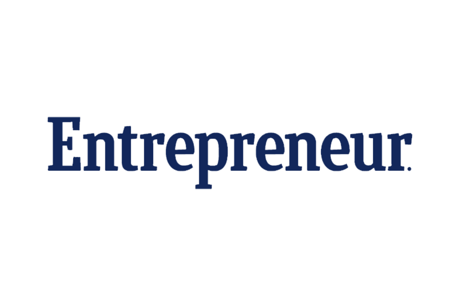 Word 'Entrepreneur' written in large blue letters with a small gift box icon above it, on a black background.
