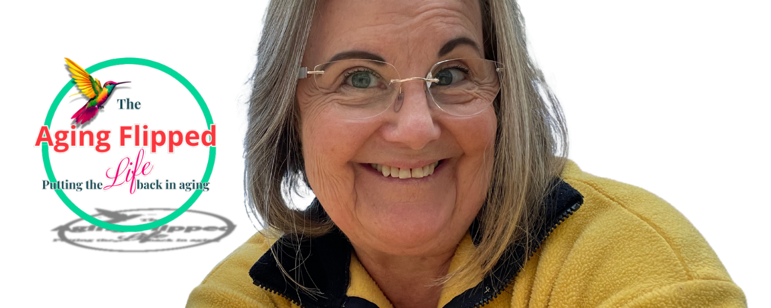 Smiling woman with glasses wearing a yellow fleece, with logo that says 'The Aging Flipped Life: Putting the Life back in aging' next to her.