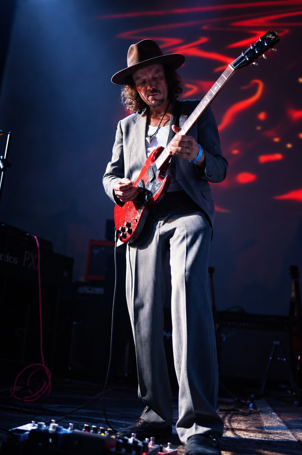 Gus playing guitar with Rotten Hill Gang