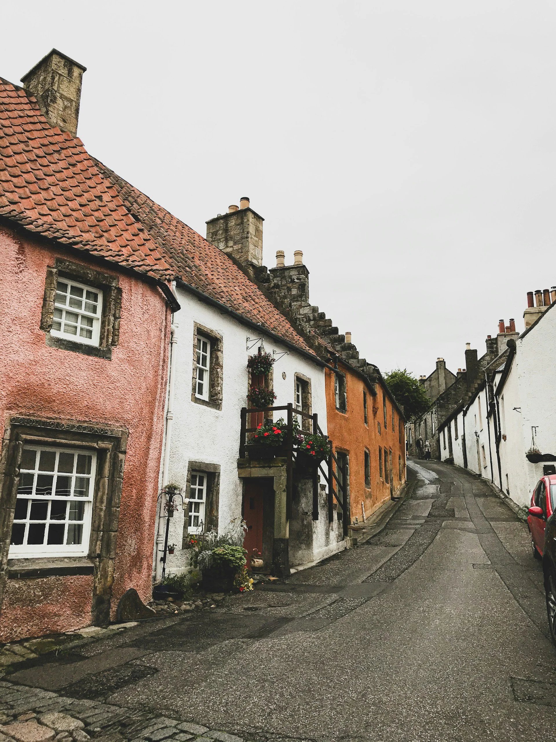 A village street with multi coloured homes