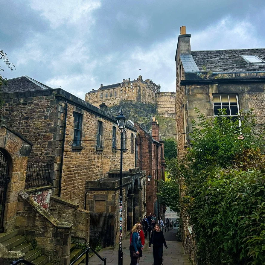 Inveraray Town from the pier. Water and small steamship in foreground