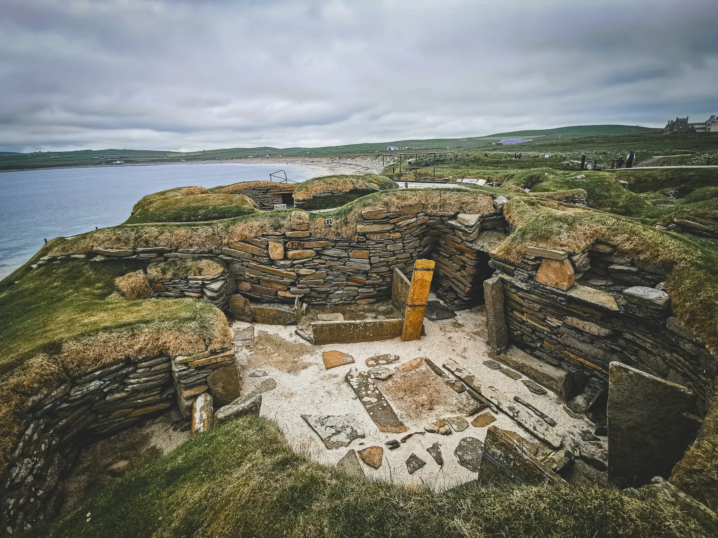 The ancient stone houses of Skara Brae, Europe's best-preserved Neolithic village in the Orkney Islands.