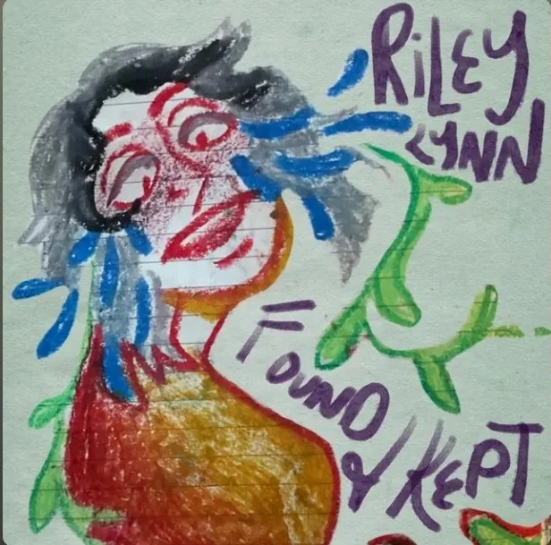 Colorful drawing of a person with black hair, crying blue tears, with words 'Riley Lynn' and 'I Found/Kept' surrounding the figure.
