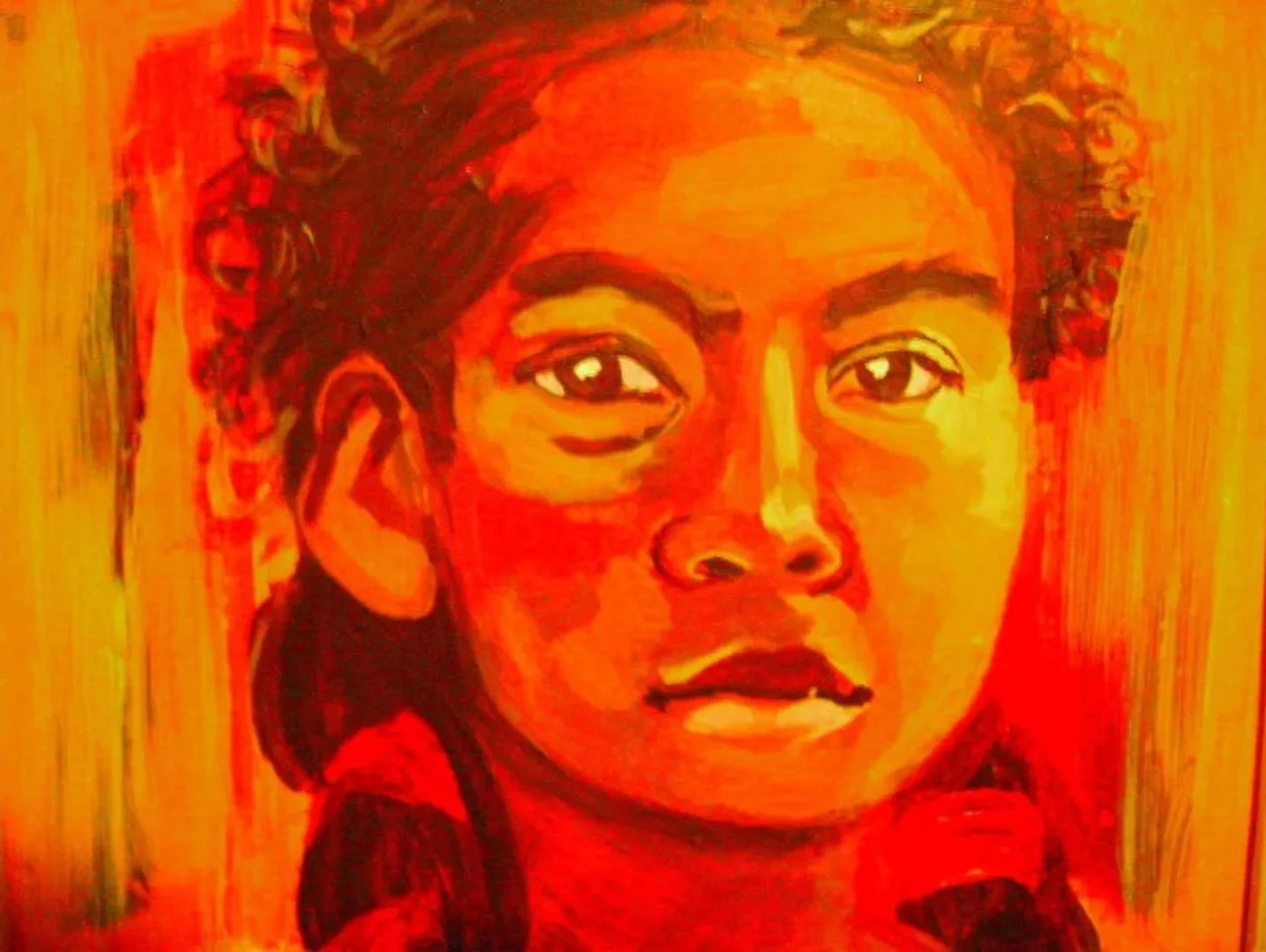 A colorful, stylized portrait of a woman with dark curly hair, expressive eyes, and full lips, painted in warm tones of red, orange, and yellow.