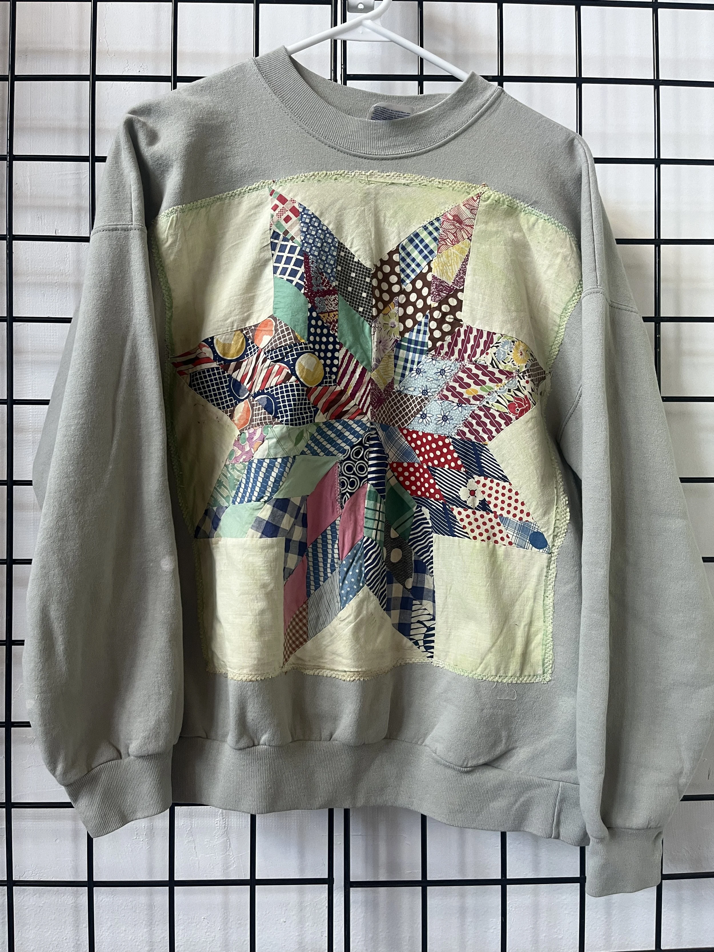 light green crewneck with distressed quilt square applique, up to L/XL