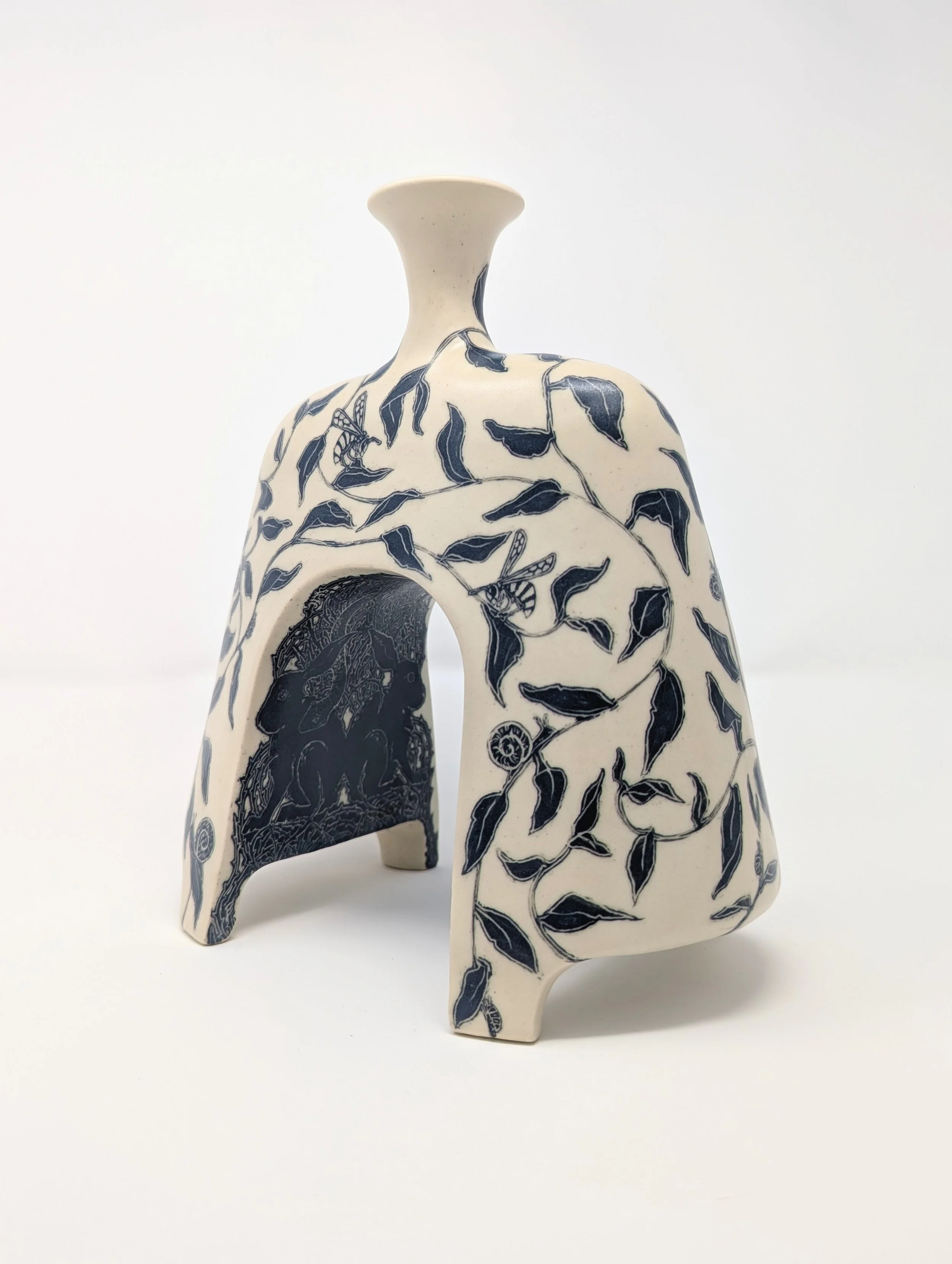 Vine Cutout Vase (1st view)
9x8.25x4.5"
$495