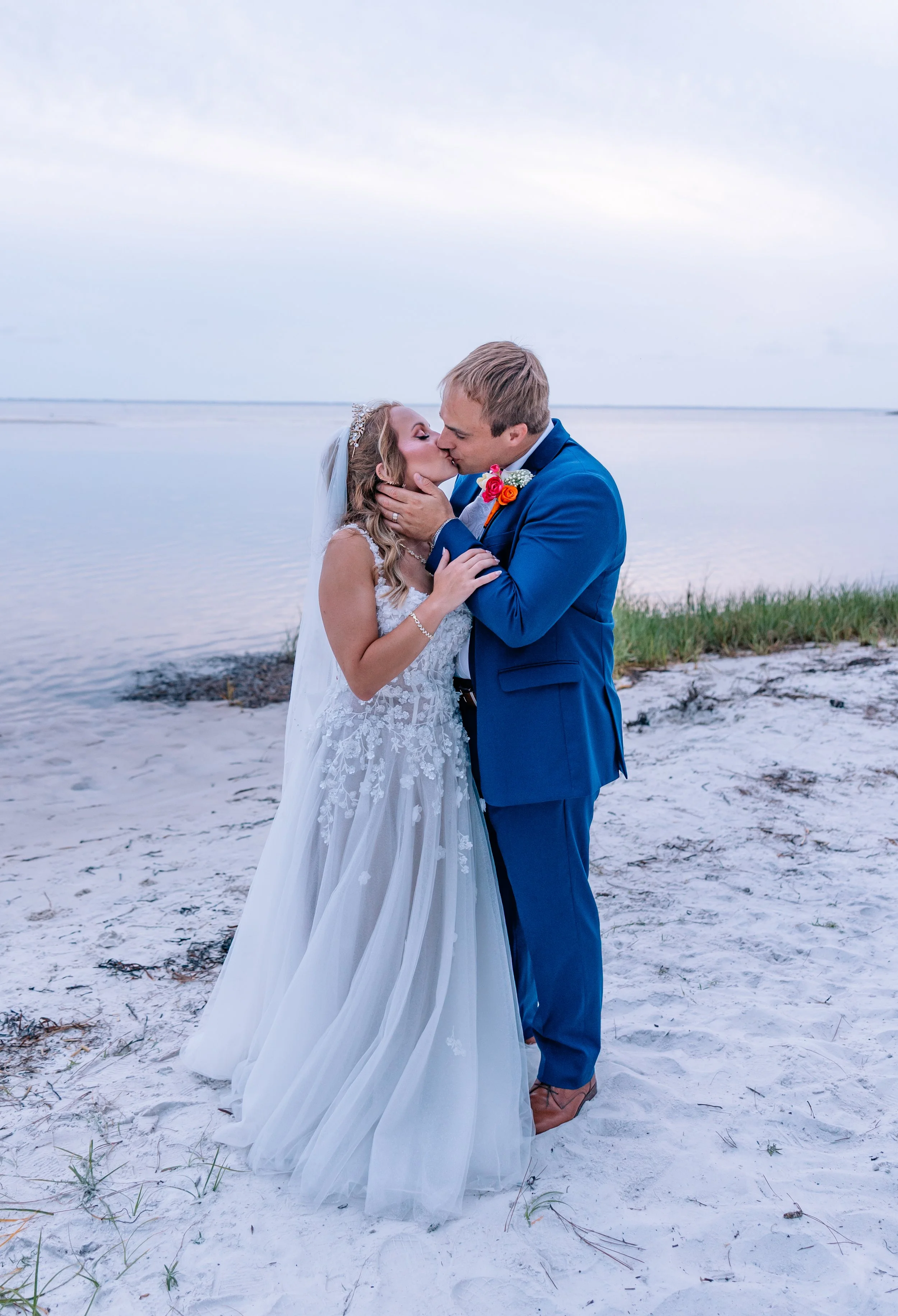 Bride and groom portraits on St Joseph Bay