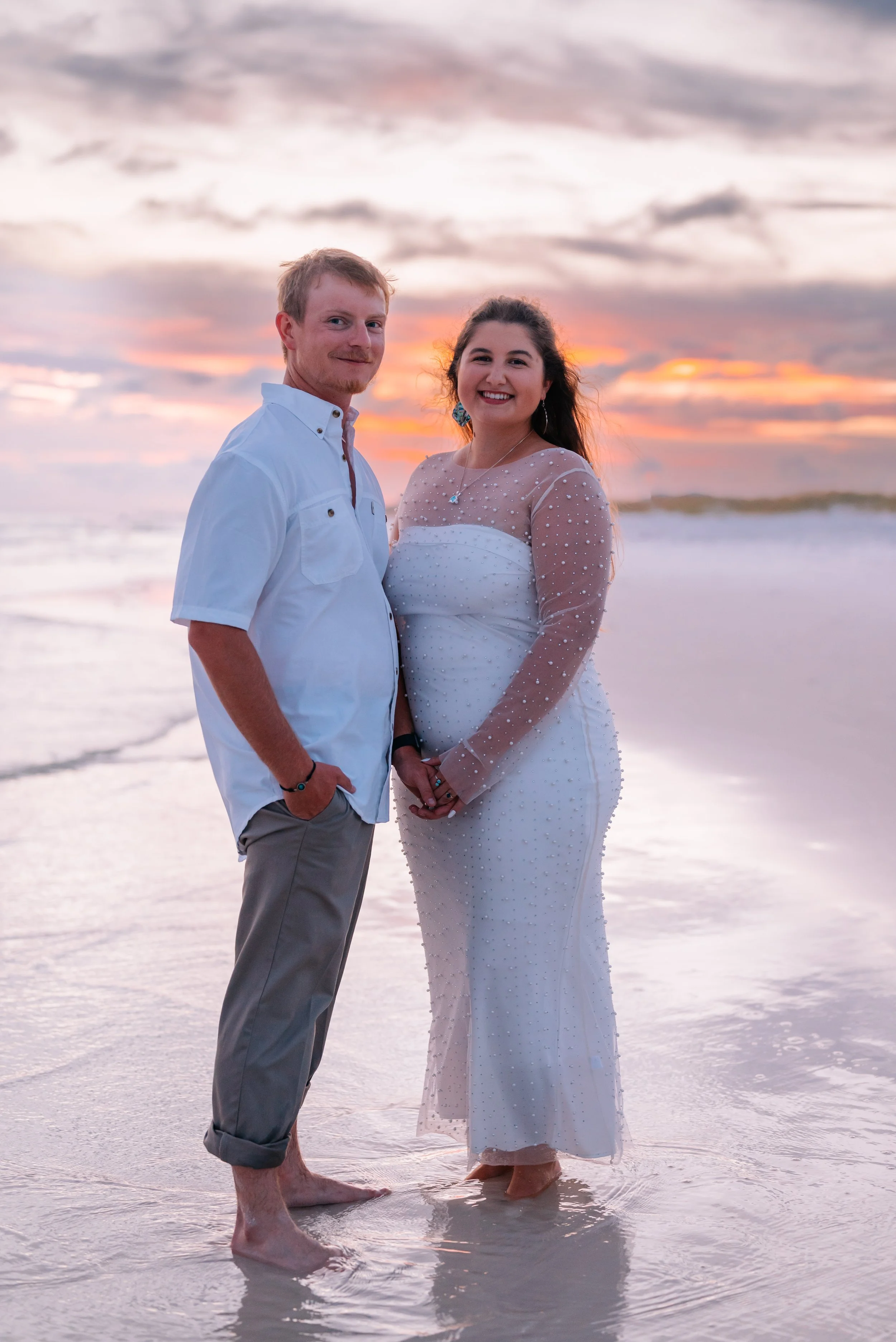 Couple at sunset on Cape San Blas, Florida