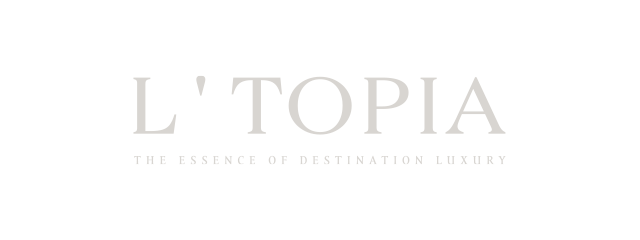 L'TOPIA logo with the tagline 'The essence of destination luxury' on a black background.