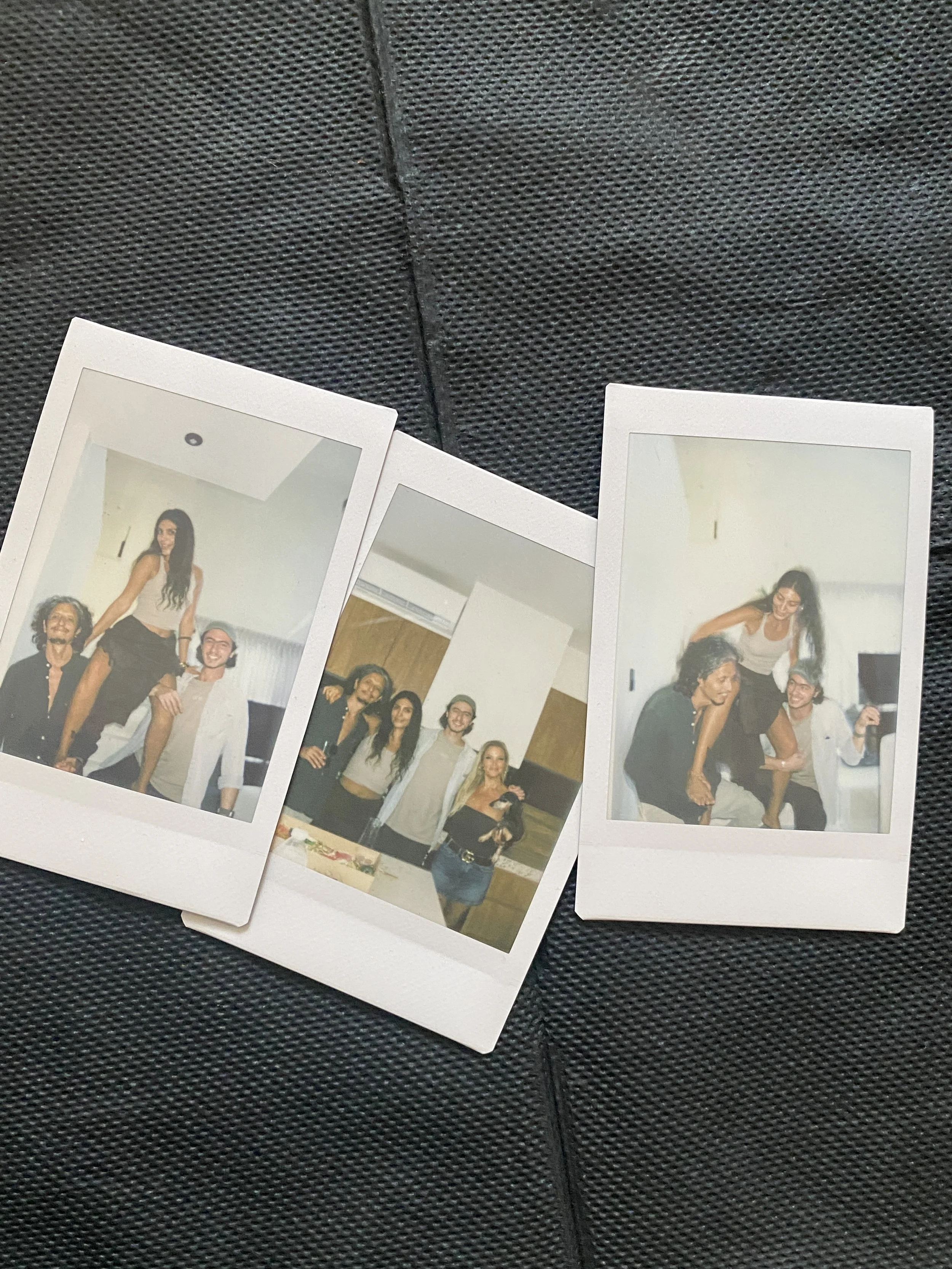 Three Polaroid photos showing Pato, Kenny and Carlos in an indoor setting with plain walls and minimal background details. Hypha Inc Marketing Agency and Creative Studio Lab, Tulum.