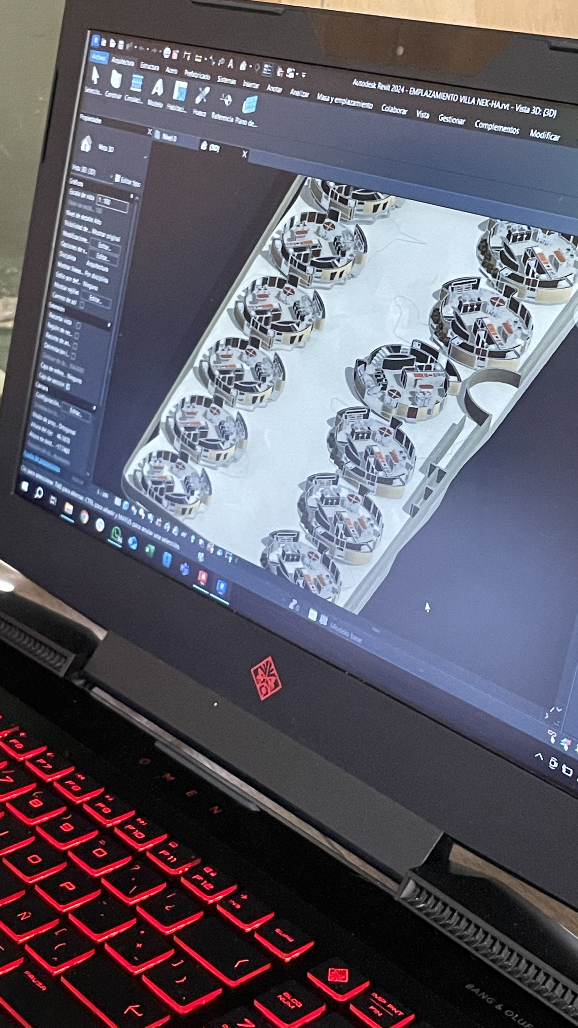 A computer screen displaying a 3D design or rendering software with multiple circular objects arranged in rows, possibly for a manufacturing or architectural project. Hypha Inc Marketing Agency and Creative Studio Lab, Tulum.