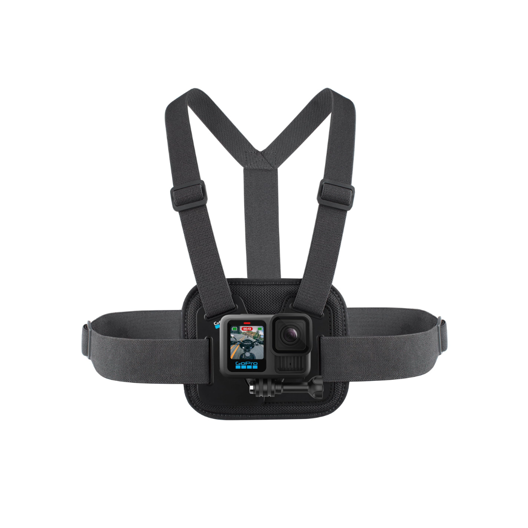 A black GoPro camera mounted on a chest harness with adjustable straps and a small pouch.