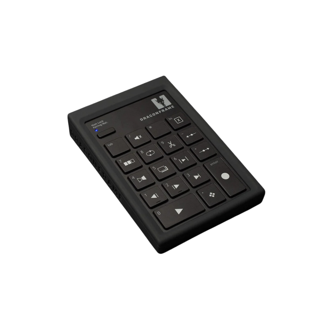 Black remote control with buttons for functions like volume, play, pause, and navigation, labeled Dragonframe.