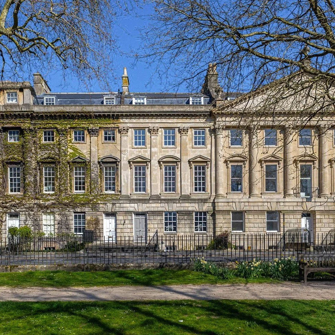 This magnificent Grade I listed Georgian townhouse, designed by renowned architect John Wood the Elder, sits on the prestigious north side of Queen Square in Bath, just a short walk from the Theatre Royal and Royal Crescent. Spanning five beautifully