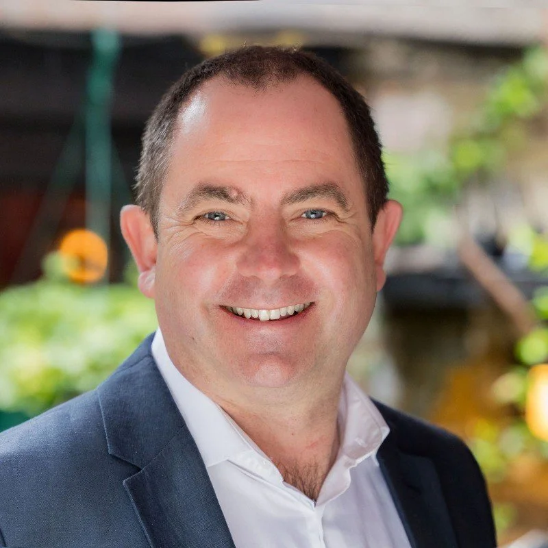 Headshot of FIPP CEO Alastair Lewis.