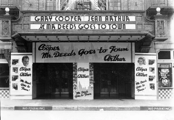 Does anyone remember The Ritz's elaborate advertisements of its current show? While they also had the movie's name in lights on the marquee, the front of the theatre was also decked out in ads for the latest feature. 

In this image, courtesy of CC P