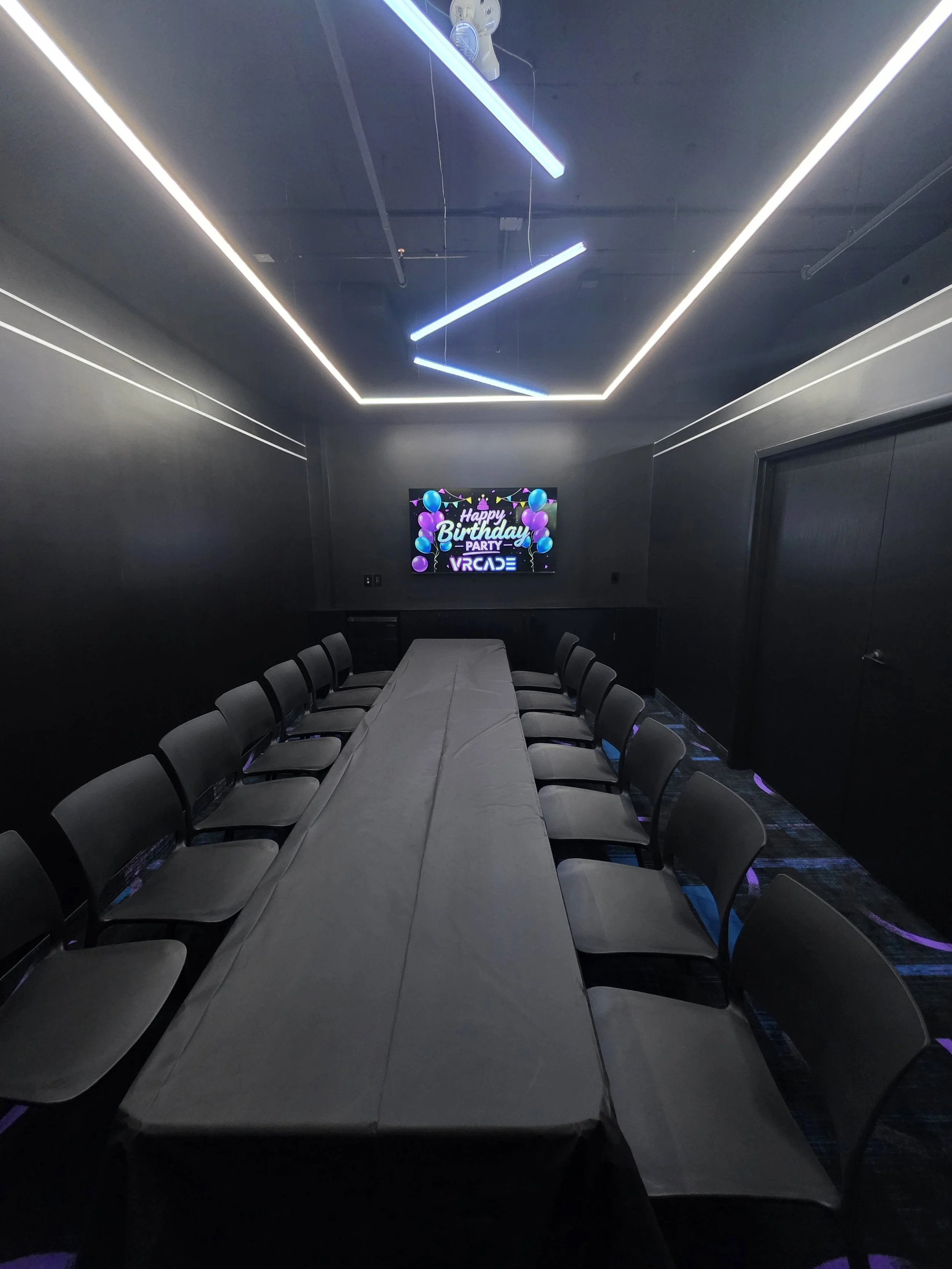 Private party room for kids birthday parties in Toronto at VRCADE with seating and celebration setup.