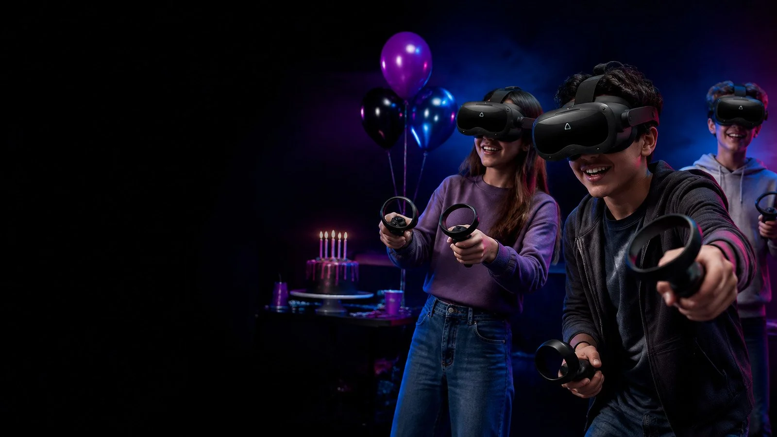 Birthday guests wearing black HTC VIVE Focus 3 headsets during a VR party at VRCADE Toronto
