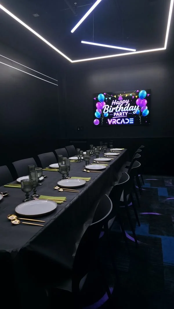 Private party room adult birthday parties in Toronto at VRCADE with seating and celebration table setup.