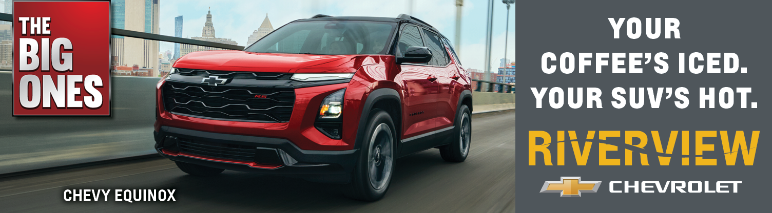 Red Chevrolet SUV driving on a city bridge with a skyline in the background, advertising Riverview Chevrolet.