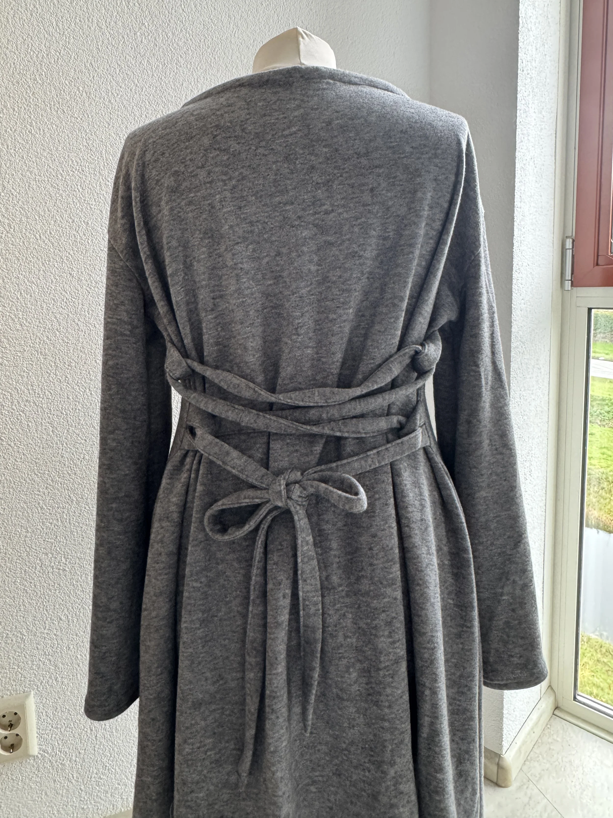 Custom change on the Corset Knit Dress. A low neckline instead of a high neckline