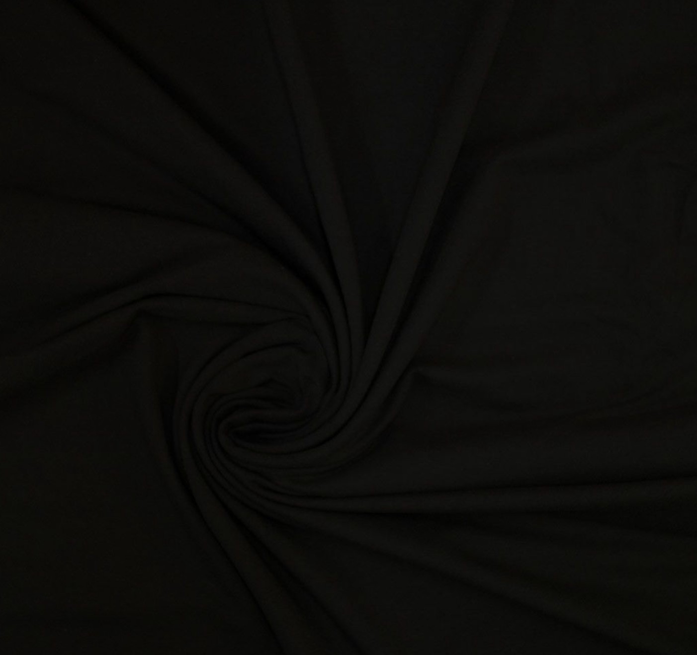 Dark fabric or material twisted into a spiral shape.