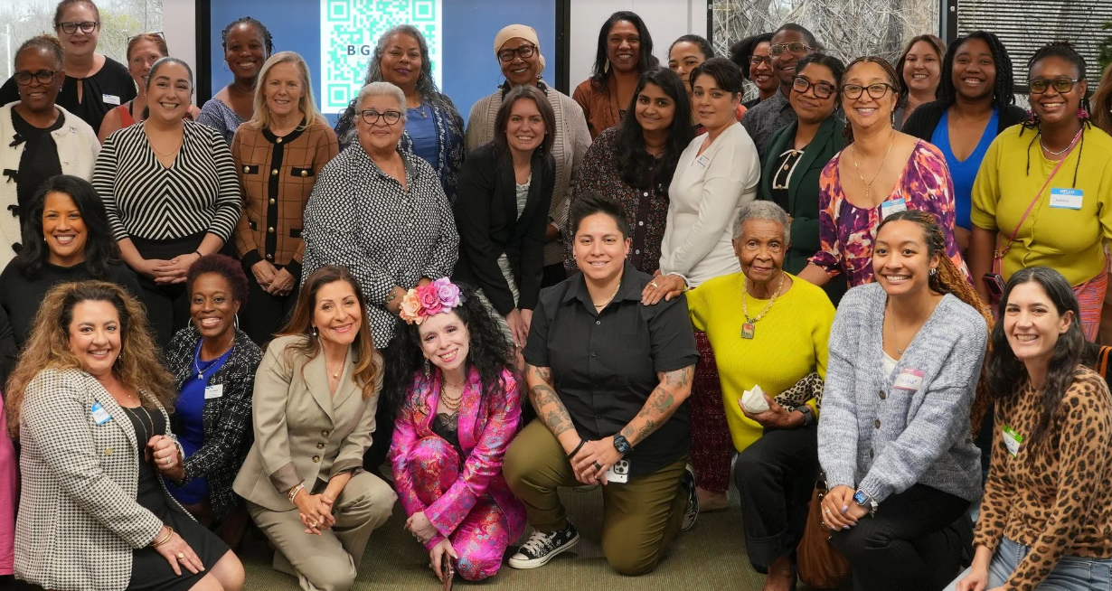 Women gathered together at a BiGAUSTIN Coffee Talk event