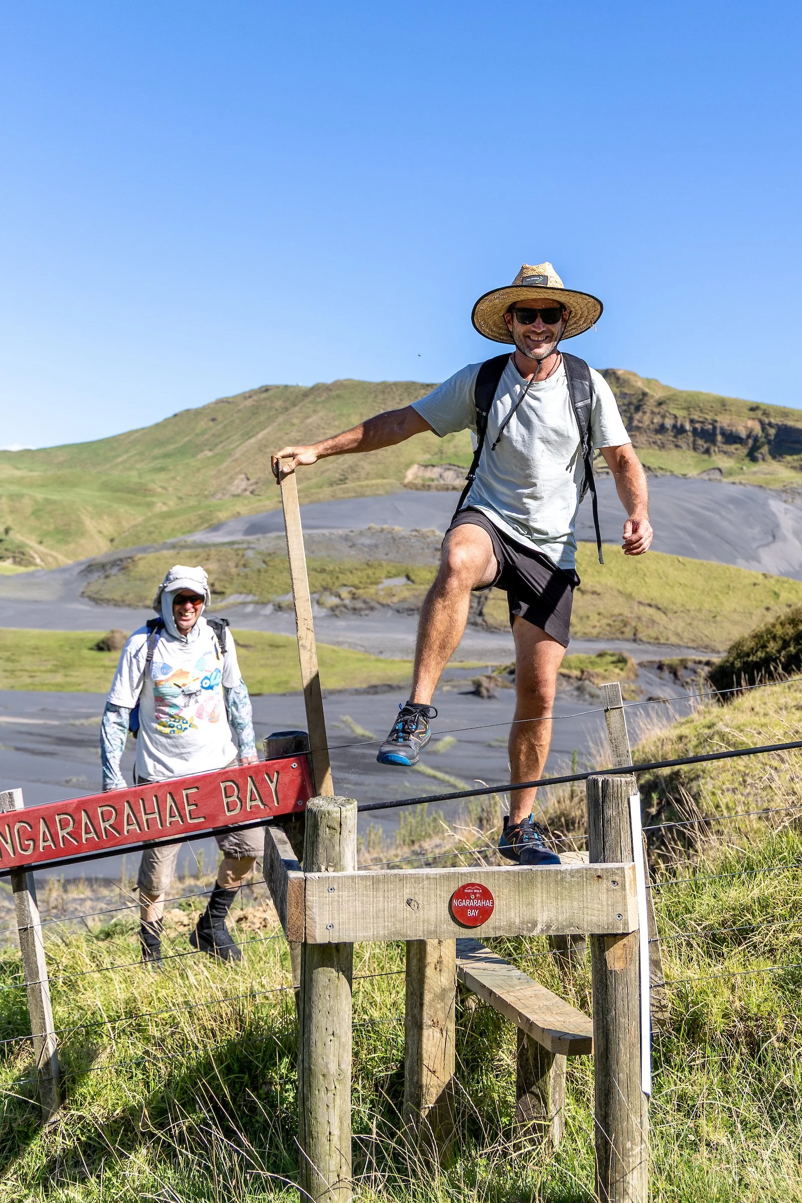 Nuku Walk Walkers Overlooking the coast of Nukuhakari Bay