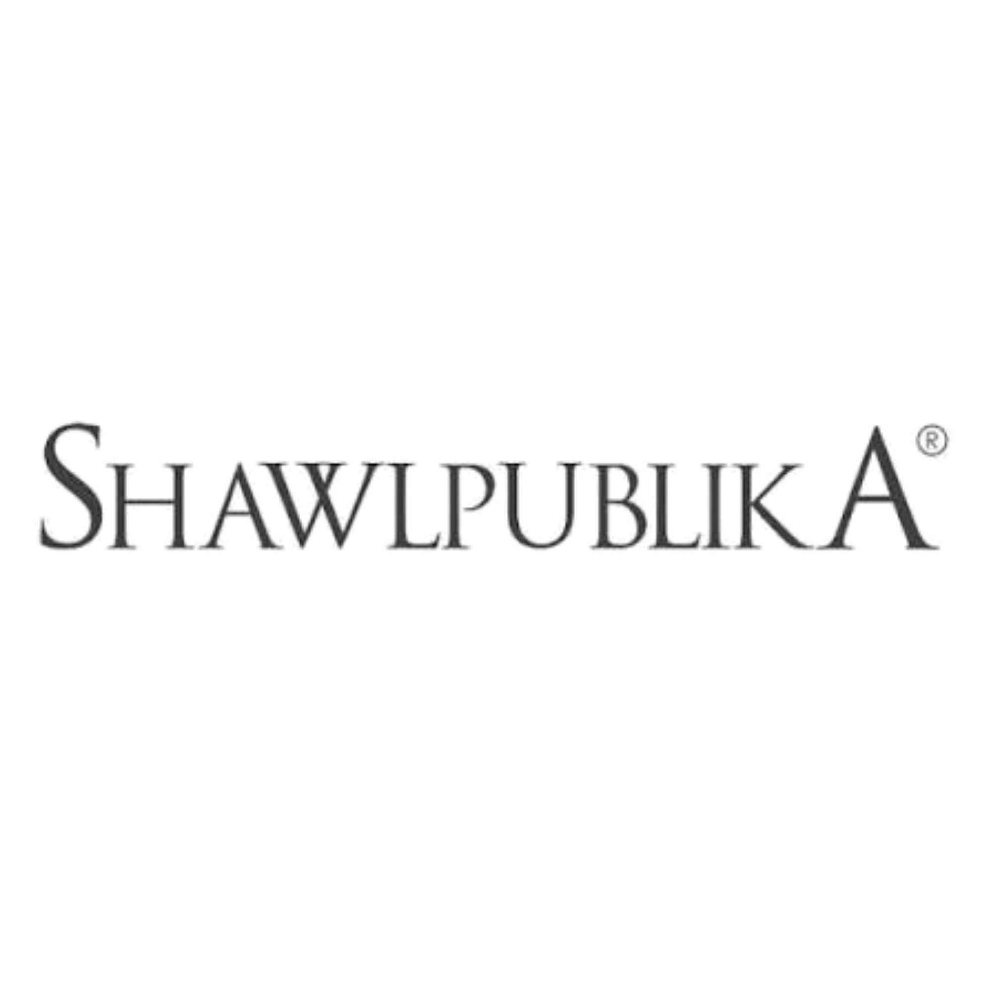 Close-up of a jewelry box with a ring inside, and the words 'Shawn J. Dubli' written underneath.