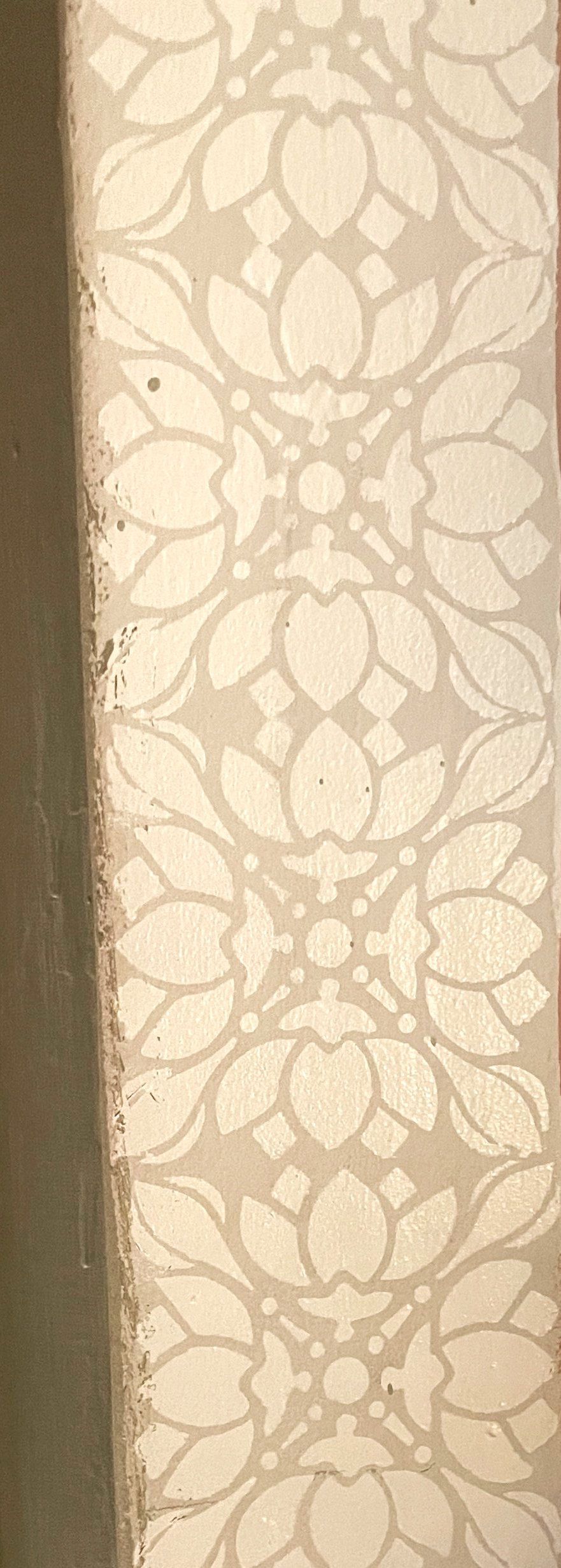 Stencils seem like such a whimsical flourish, but they're so practical. They're like patterned rugs: they hide the inescapable mess. Shaking dogs after a rainy walk? Check. Muddy soccer players? Check. Dragging a Christmas tree through the space? Che