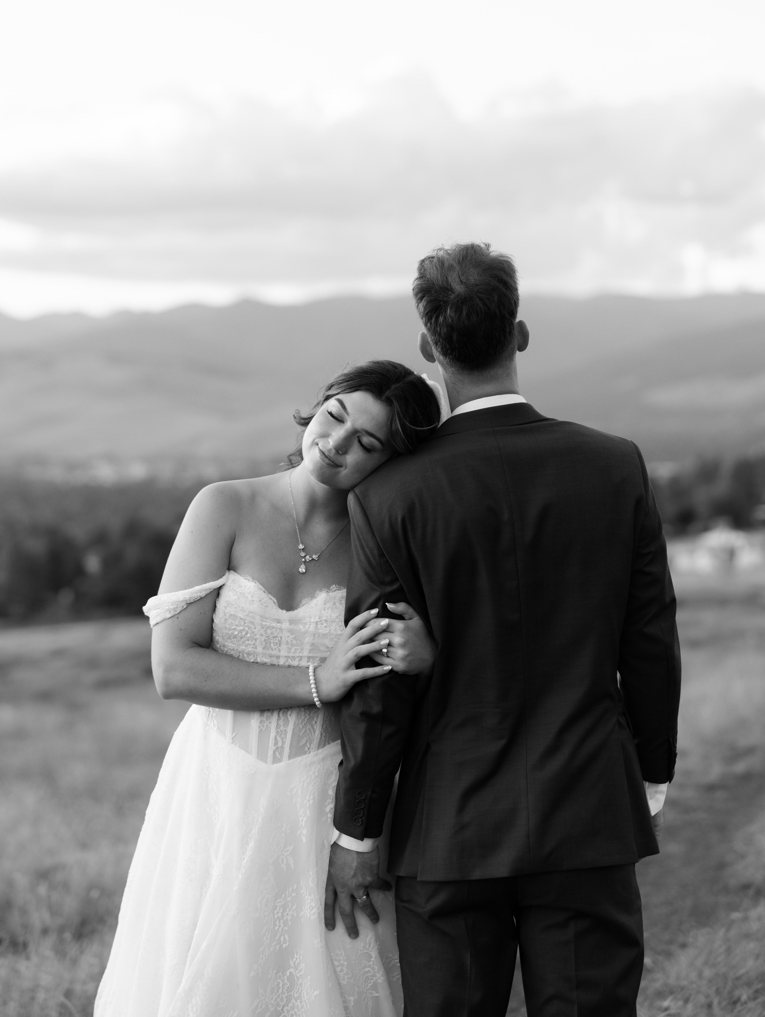 Black and white photo of a newly married couple on their wedding day.