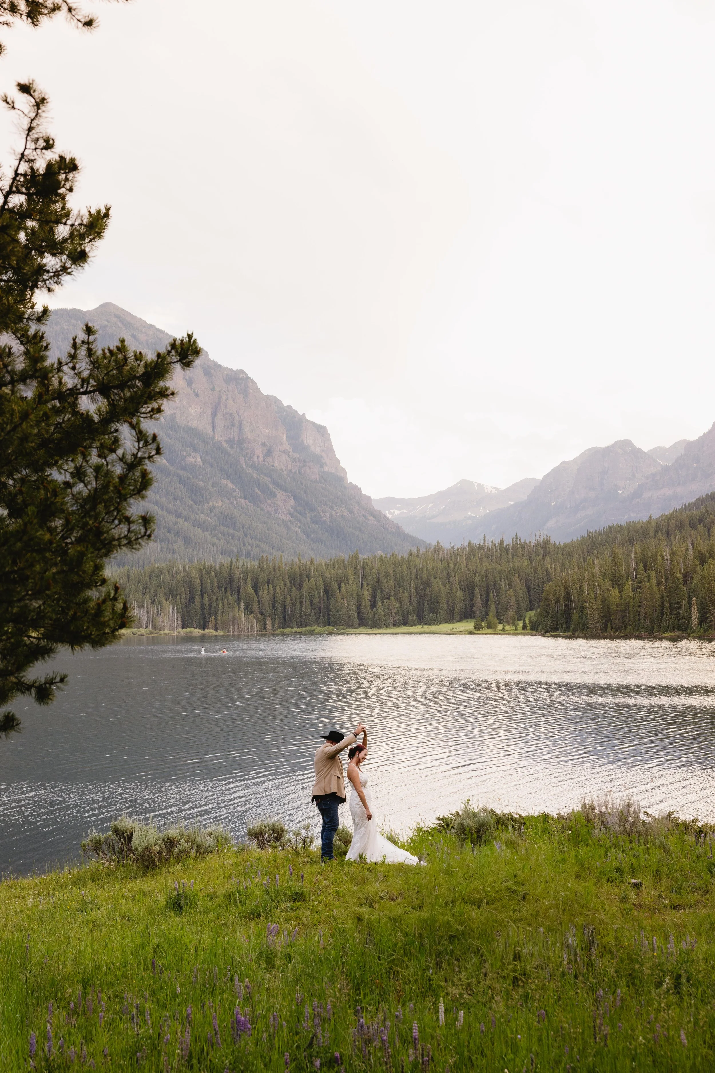 A man and woman dance on their elopement day near Big Sky, MT