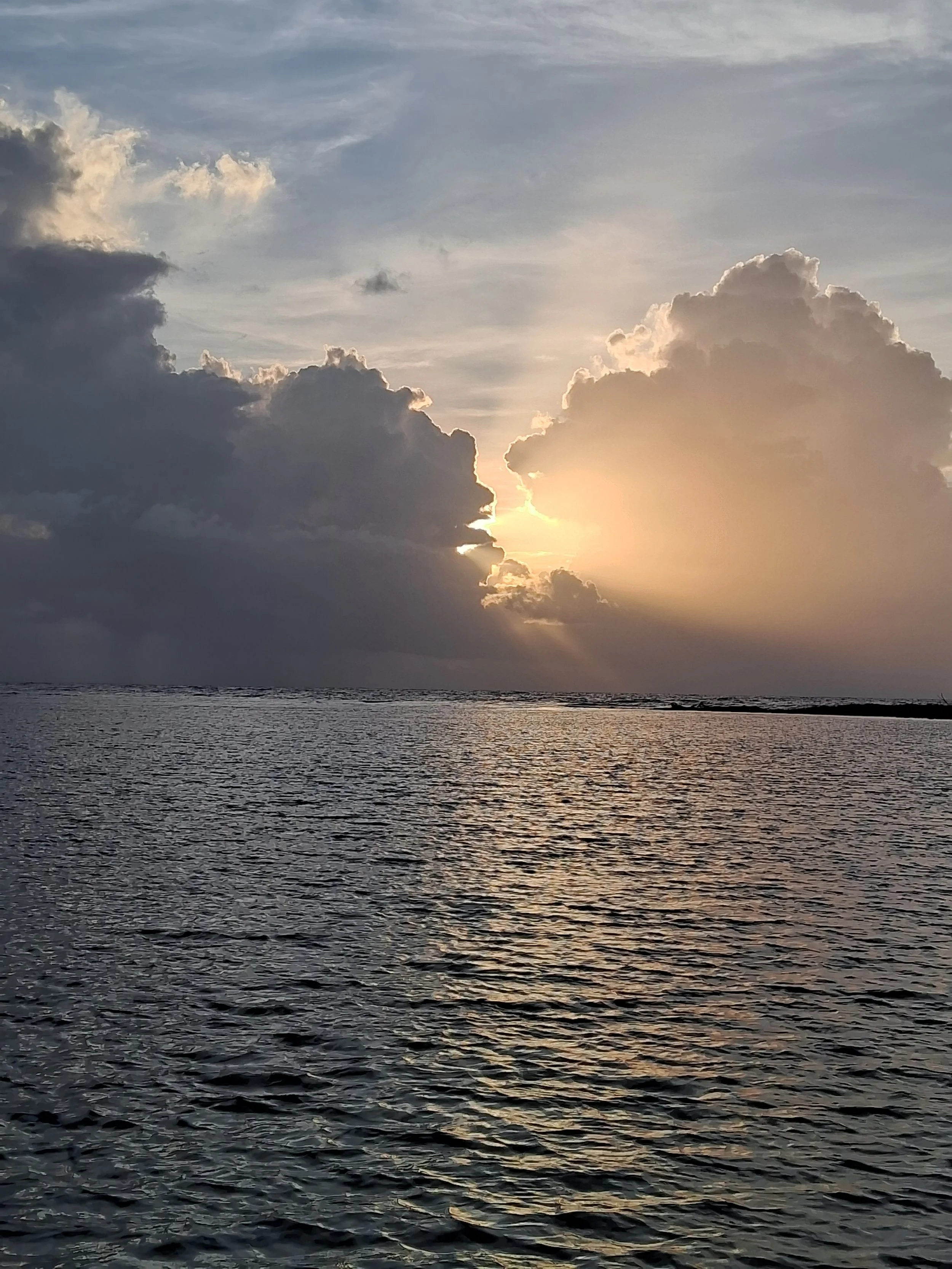 Sunset through clouds.jpg