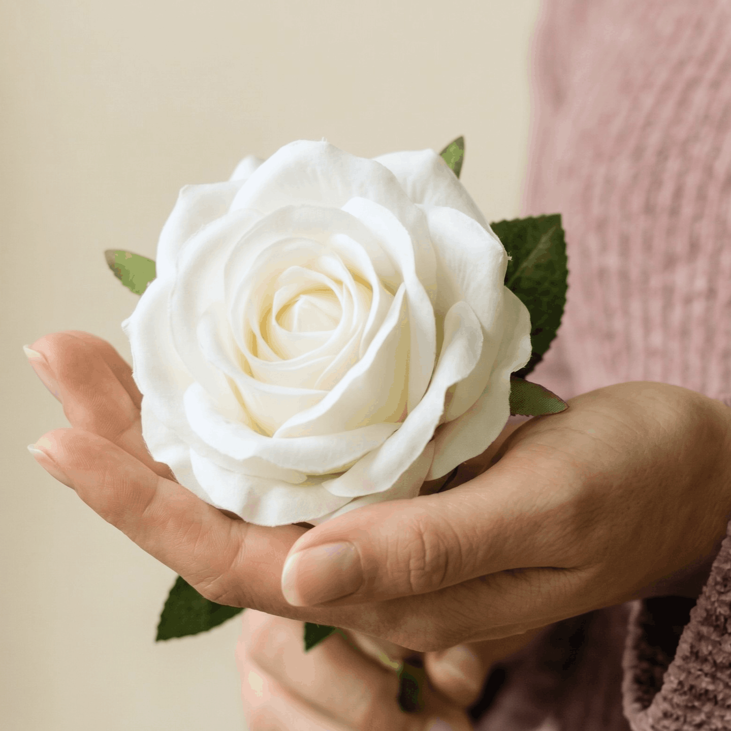 High-quality white faux roses and greenery used in a luxury Nashville elopement flower arch rental.
