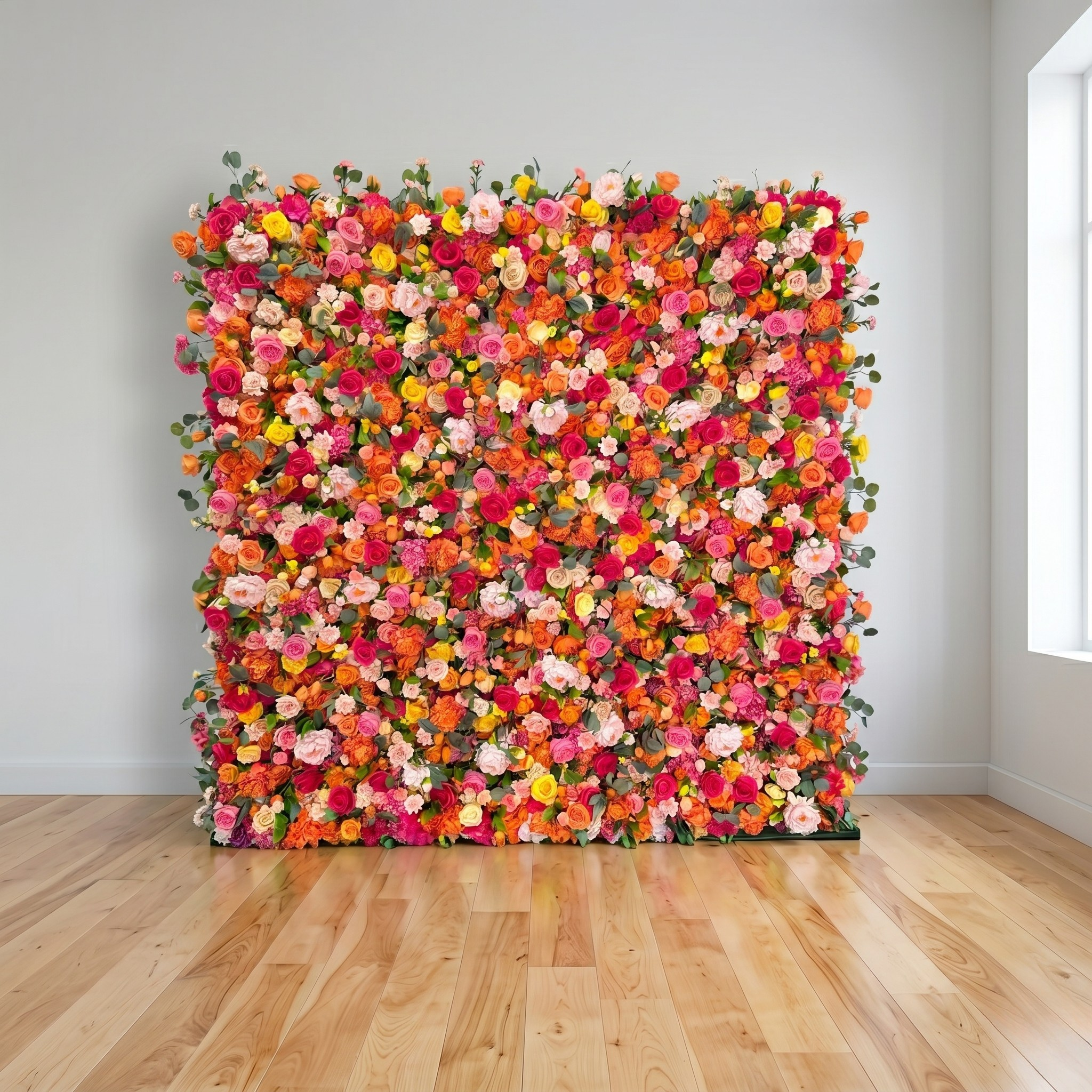 Bright hot pink and orange floral wall backdrop rental on maple wood flooring, perfect for weddings, parties, and corporate activations in Nashville.