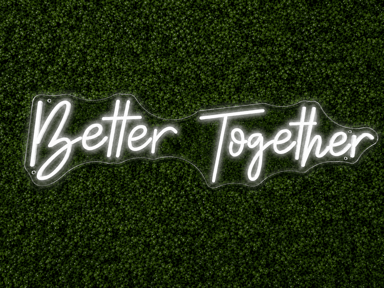 Better Together white LED neon sign rental on clear acrylic displayed on a boxwood wall in Nashville