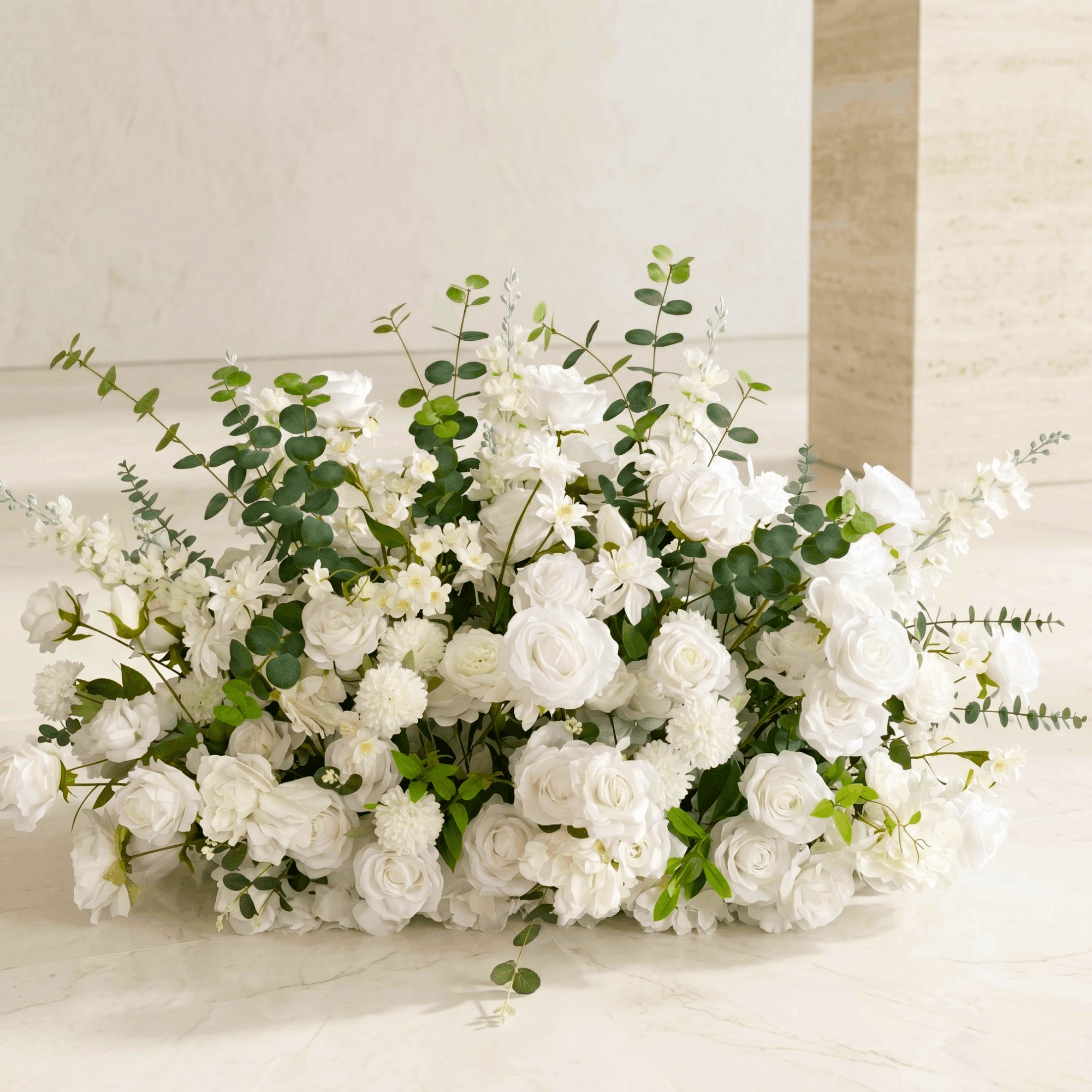 Versatile white silk flower meadow backdrop, artificial floral floor arrangement for wedding aisles or sweetheart tables, professional-grade ceremony flowers for nationwide shipping.