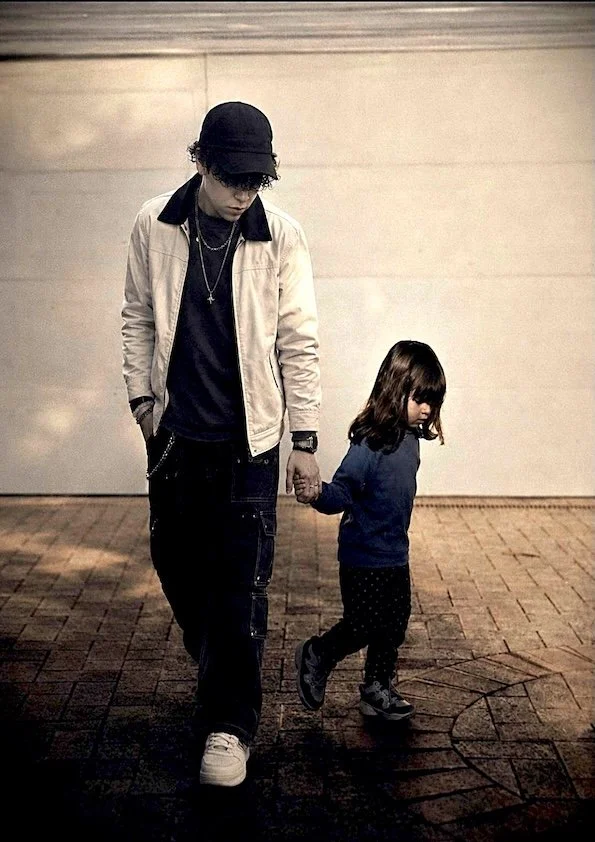 Maxwell - Untitled (2026) - Photography - I am a trans male, and this photo I made is of me as a guy and me when I was little, showing how hard life is being trans, all the hate and name-calling, but me being transgender doesn't mean I don't deserve 