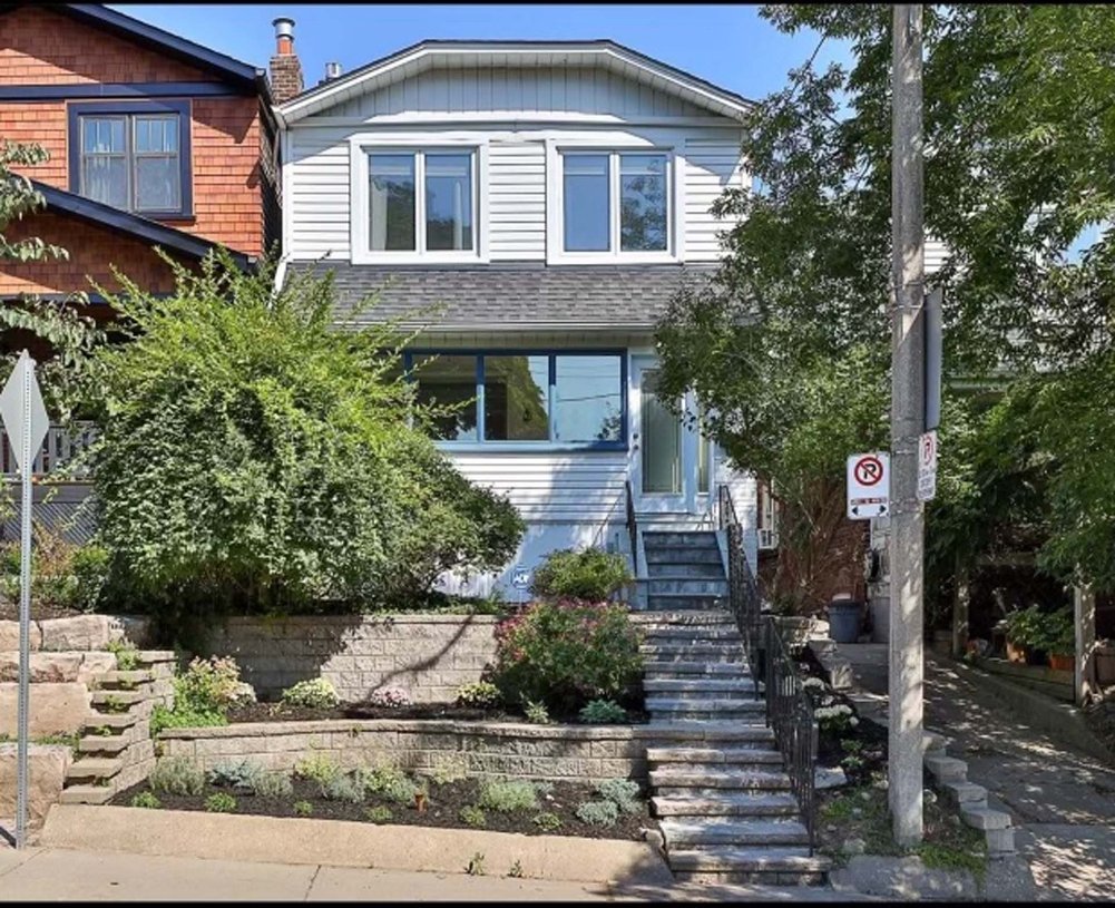 Before: Toronto house on a small sloped yard with no parking